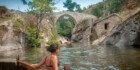 Girl in Gradeshka River near the Movie Bridge in Zovich village